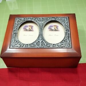Elegant Brown and Silver Picture Frame with Intricate Scrollwork